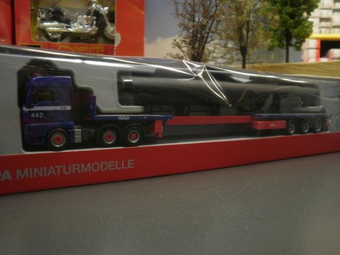 Herpa MAN TGX GX Wechselkoffer-Hängerzug DHL (313049)